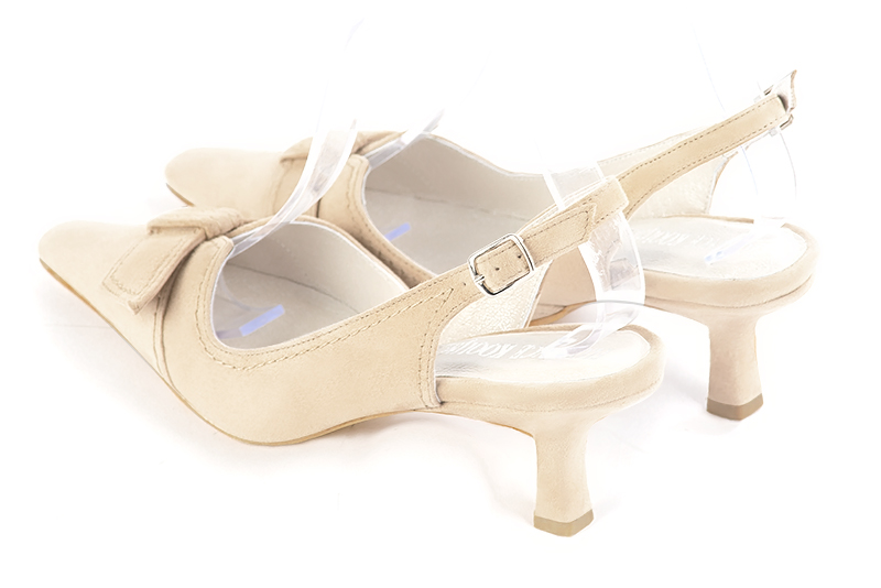 Champagne beige women's open back shoes, with a knot. Tapered toe. Medium spool heels. Rear view - Florence KOOIJMAN